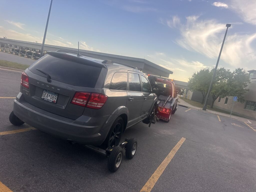 SUV being loaded by a tow truck near North Loop Minneapolis
